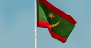 The Flag of Mauritania against the Sky