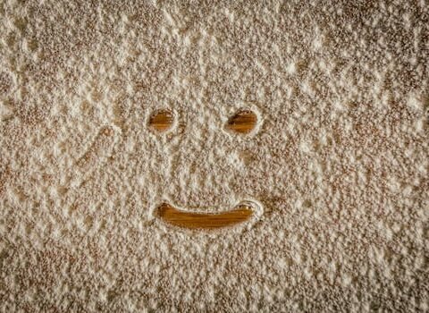 Flour With Smiling Face on Parquet Flooring