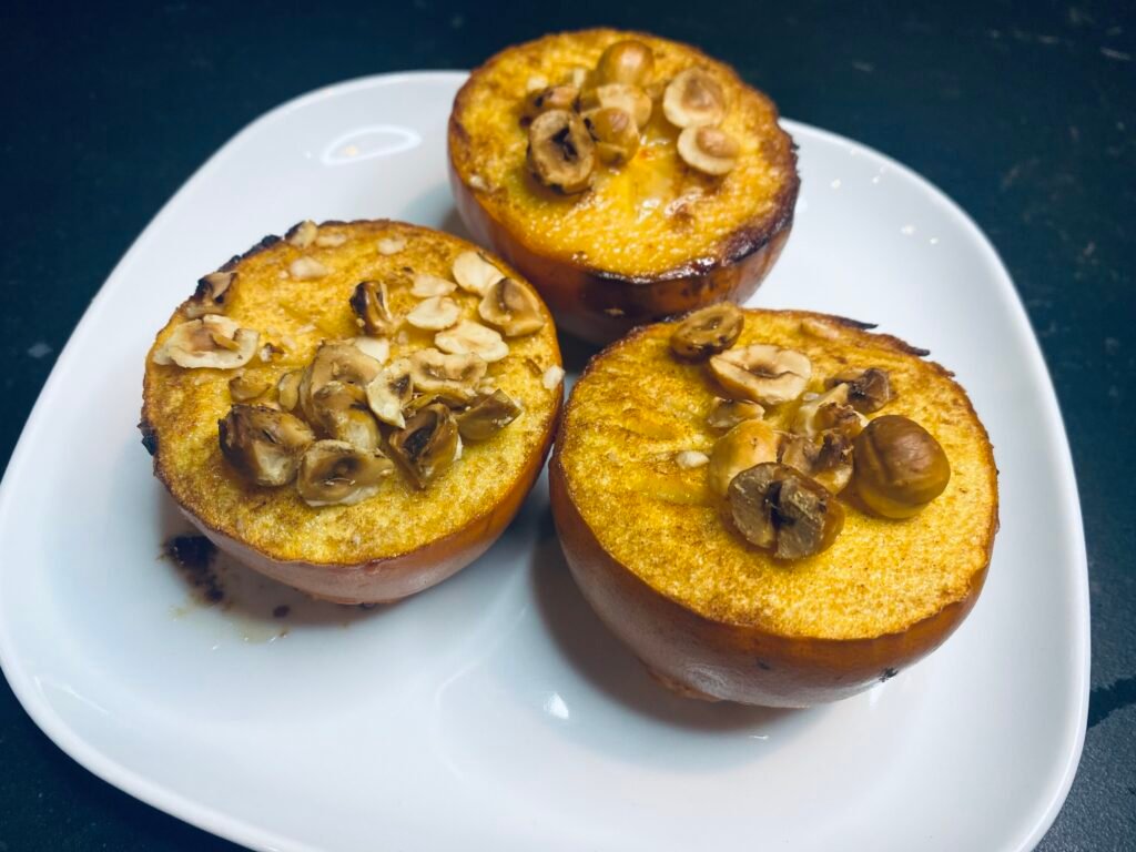 Roasted persimmons with honey and hazelnuts, Lebanon