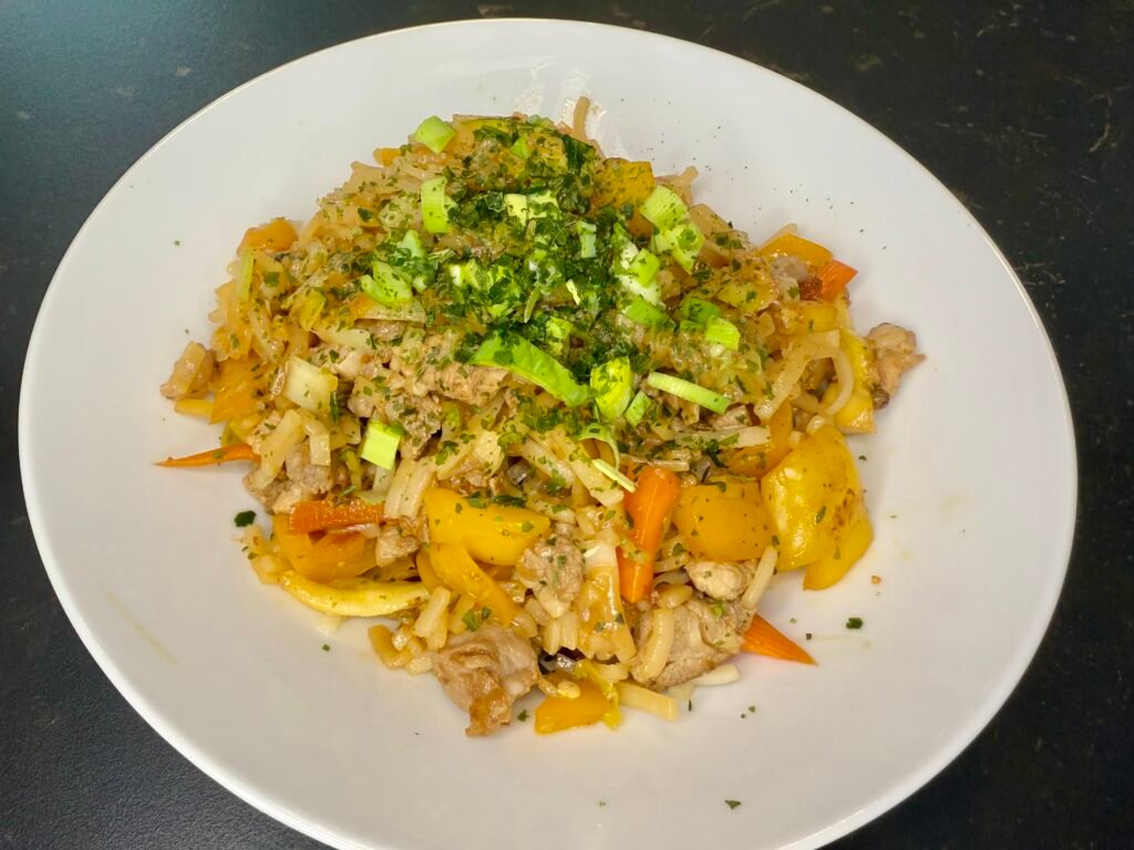 Pork and vegetables sautéed noodles, China